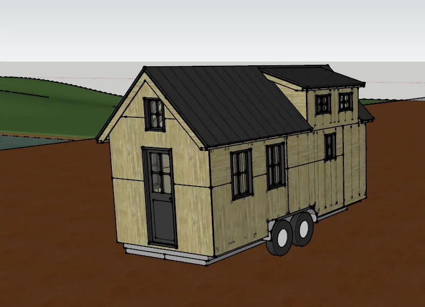 Tiny home with pitched roof, loft dormer, wood siding, black metal roof, and trailer chassis
